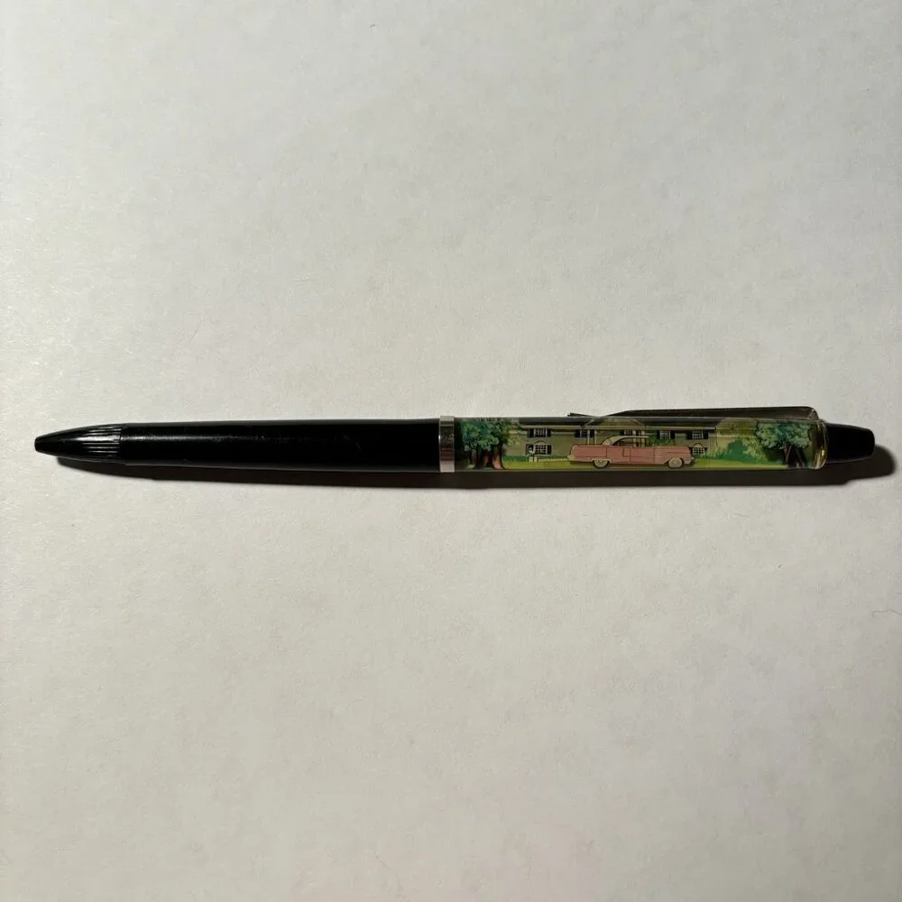 Graceland Floaty Pen Home of Elvis Presley Pink Cadillac Moves Souvenir Novelty